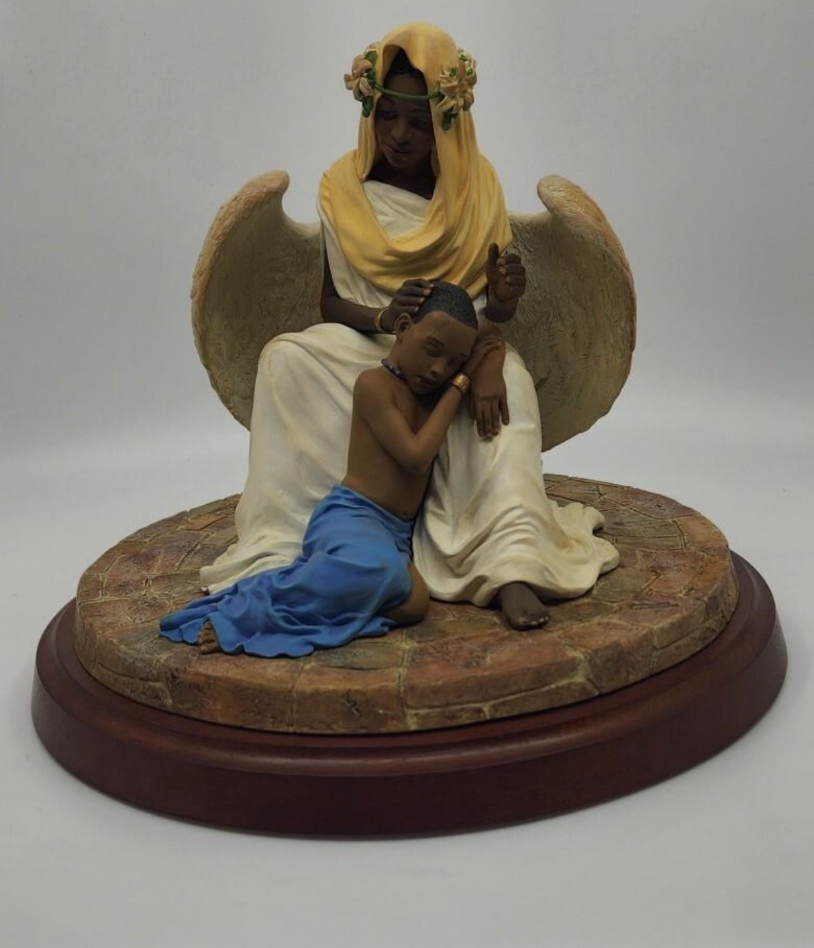 Angel with resting child